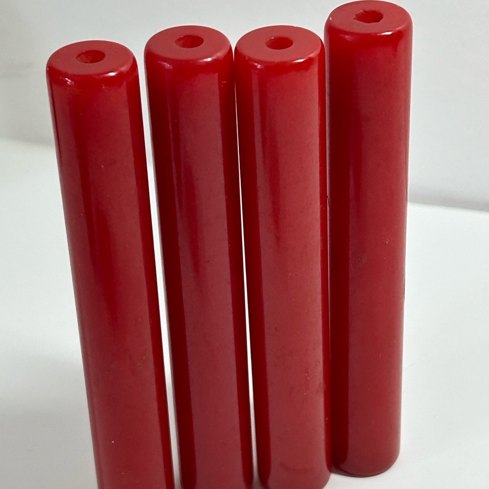 Antique Bakelite drilled tubes in cherry red
